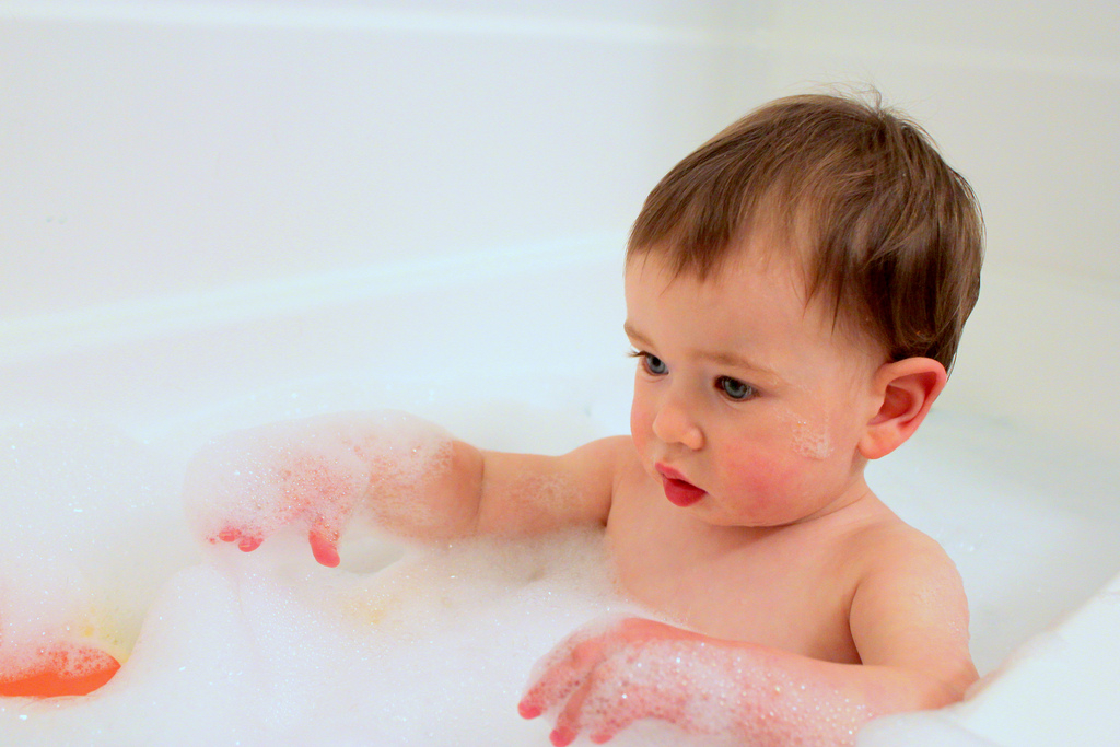 A child in a bubble bath